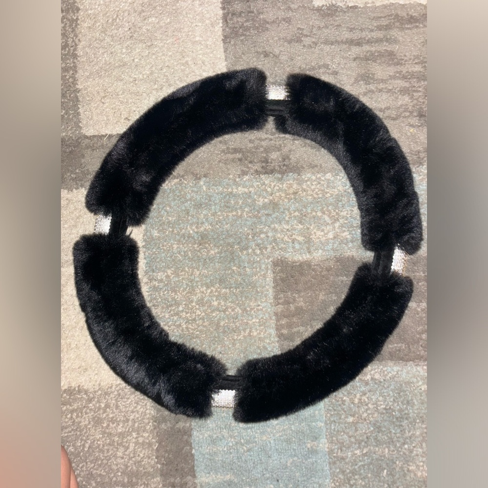 Furry steering wheel cover.